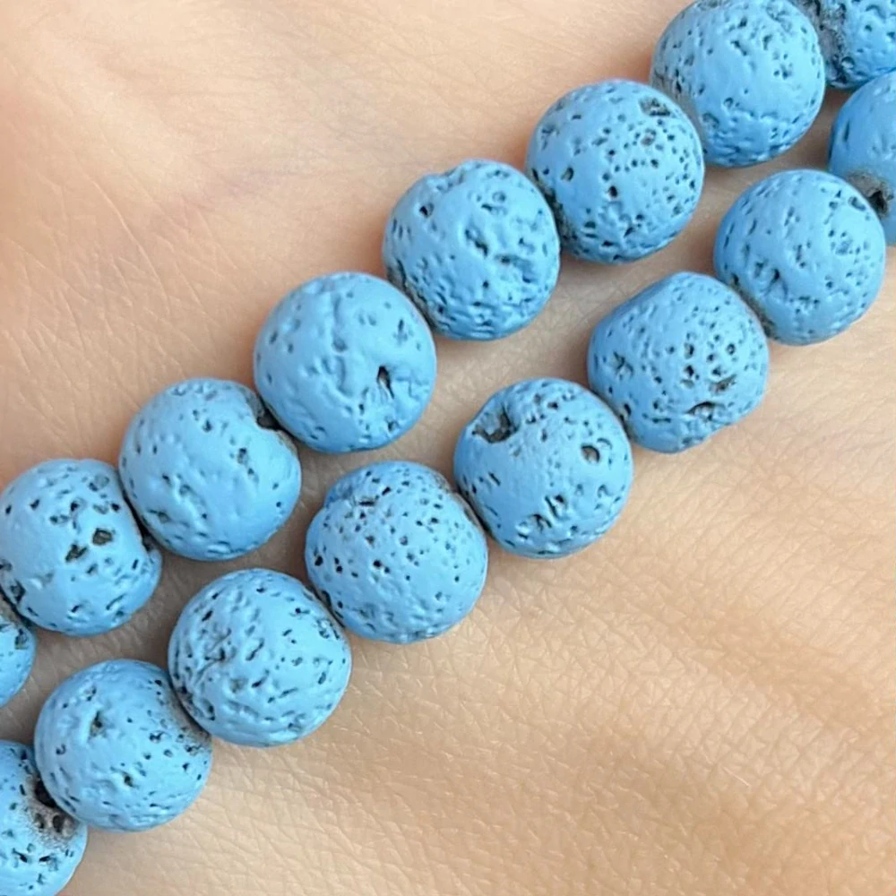 Láva světle modrá, 8 mm, půlšňůra 19 cm (cca 23 korálků)