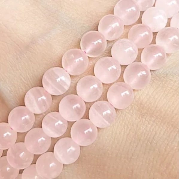 Kalcit růžový, 6 mm, půlšňůra 19 cm (cca 23 korálků)