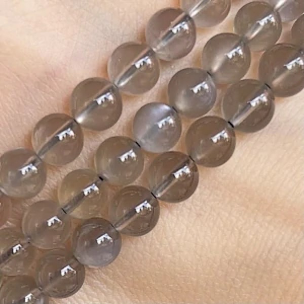 Měsíční kámen šedý, kvalita A, 6 mm, půlšňůra 19 cm (cca 32 korálků)