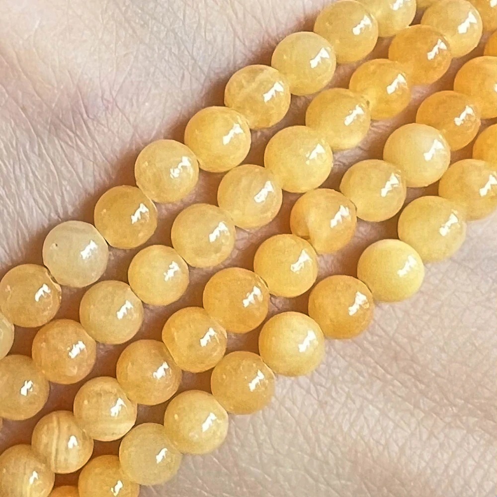 Jadeit tmavě žlutý barvený, 4-4,5 mm, šňůra 38 cm (cca 92 korálků)