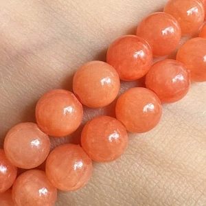 Jadeit oranžový barvený, 8 mm, šňůra 38 cm (cca 46 korálků)