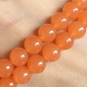 Jadeit oranžový, 8 mm, šňůra 38 cm (cca 46 korálků)