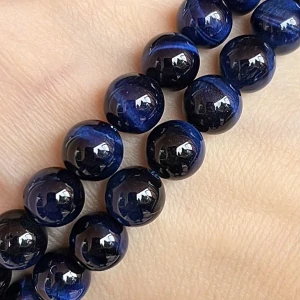 Tygří oko modré, 8 mm, půlšňůra 19 cm (cca 23 korálků)