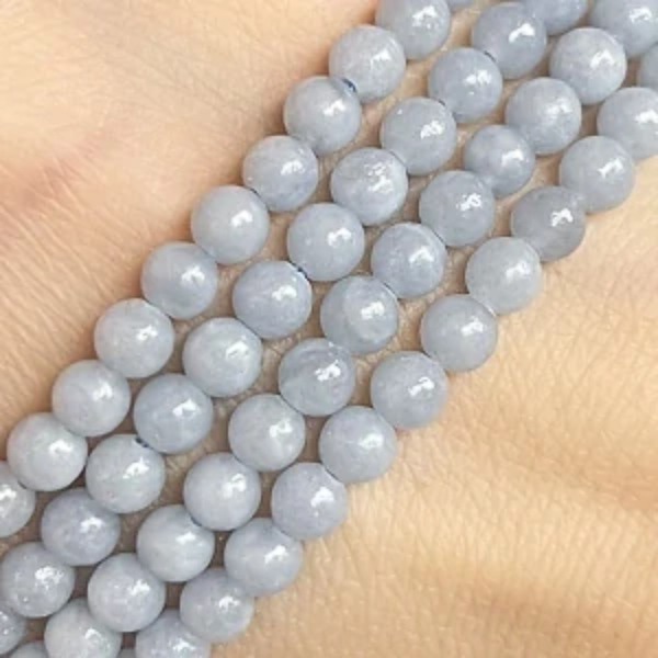 Angelit, kvalita B, 4-4,5 mm, půlšňůra 19 cm (cca 43 korálků)