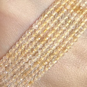 Citrín pálený, 2 mm, fasetovaný, šňůra 38 cm 