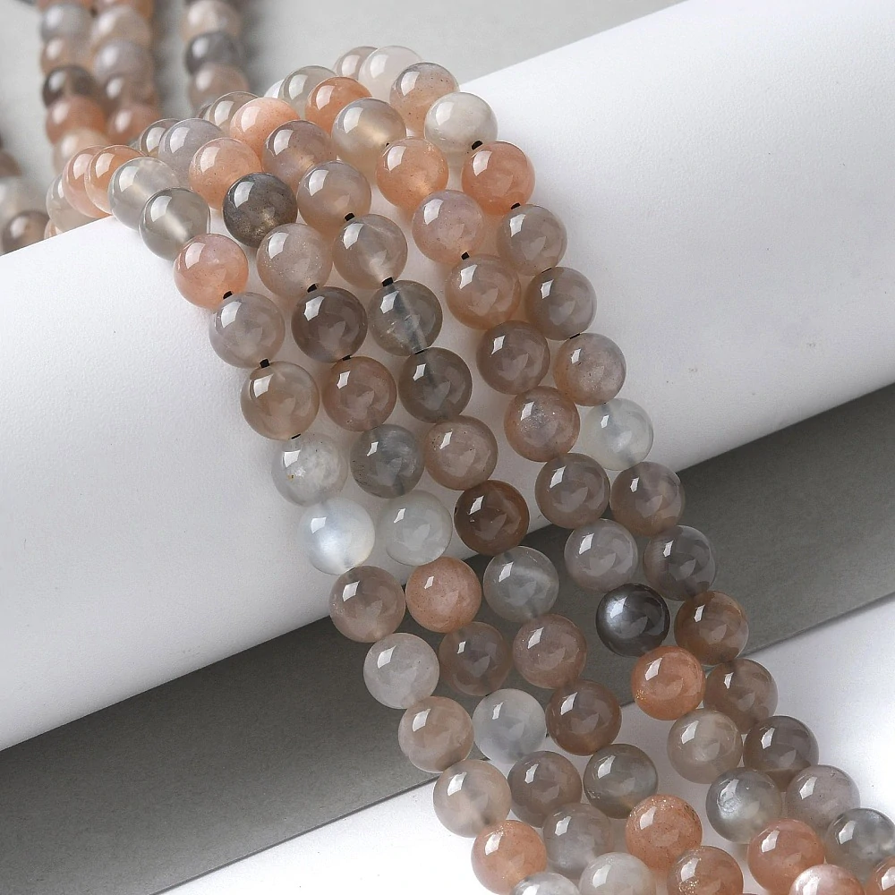Měsíční kámen mix barev, kvalita AAA, 6-7 mm, půlšňůra 19 cm (cca 32 korálků)