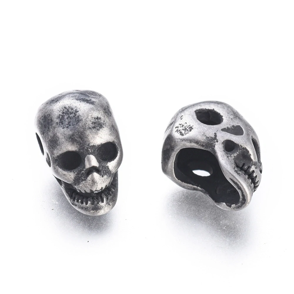 304 Nerezový korálek Lebka ohořelá, stříbrný, 12x7x9.5mm