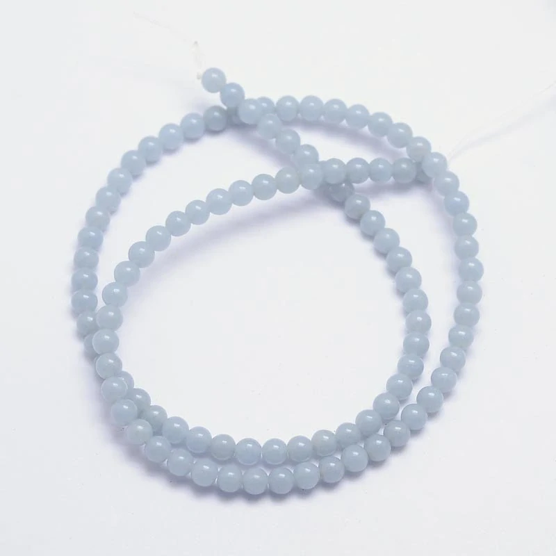 Angelit, 6,5-7 mm, půlšňůra 19 cm (cca 29 korálků)