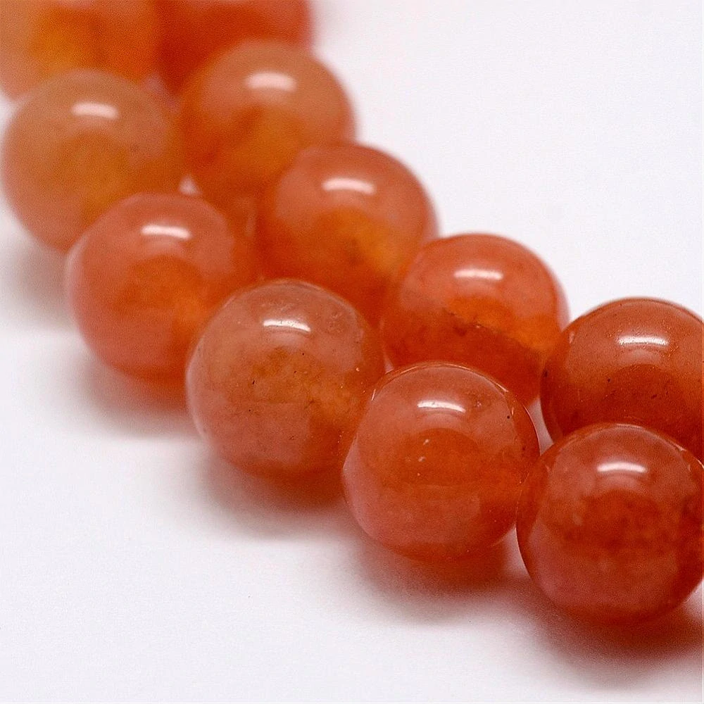 Avanturín červený; 8-8,5 mm, šňůra 38 cm (cca 46 korálků)