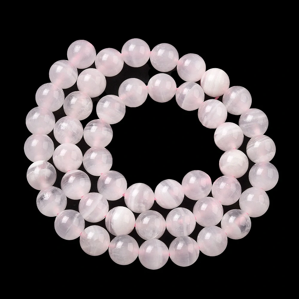 Kalcit růžový, 8-8,5 mm, půlšňůra 19 cm (cca 23 korálků)