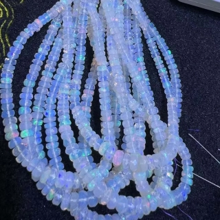 Drahý opál fasetovaný, rondelky, 3,5-5x2 mm, půlšňůra 19 cm